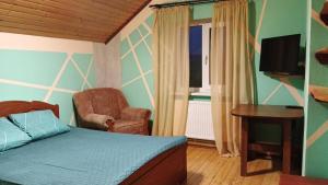 TV a/nebo společenská místnost v ubytování Milana Guesthouse