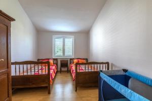 Postel nebo postele na pokoji v ubytování Apartment Pero