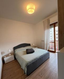 Ένα ή περισσότερα κρεβάτια σε δωμάτιο στο Al mare da Ombretta