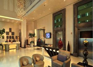The lobby or reception area at Park Plaza Faridabad