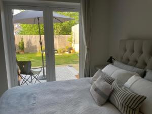 Postel nebo postele na pokoji v ubytování Cornwall Tranquil Retreats