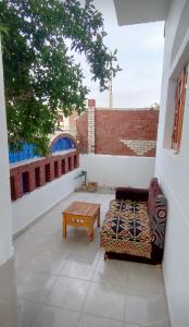 Posezení v ubytování Pro Luxor guest house + 7 fotografií