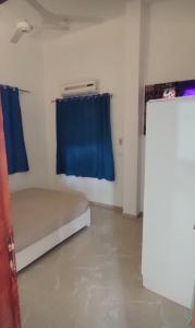 Postel nebo postele na pokoji v ubytování Pro Luxor guest house