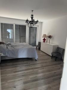 Postel nebo postele na pokoji v ubytování Paradies Villa
