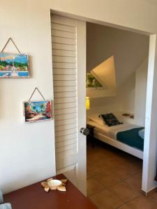 Postelja oz. postelje v sobi nastanitve TI COCOTIER Appartement VUE MER 2 à 6 personnes village Pierre et vacances