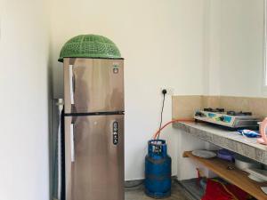 a refrigerator with a green dome on top of it at Hiriketiya Hasmal House in Hiriketiya
