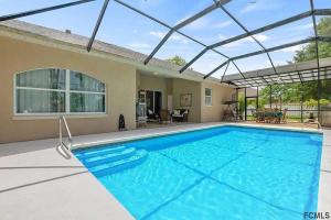 Bazén v ubytování Cheerful 4 bedrooms 3 bath pool in a quiet neighborhood nebo v jeho okolí