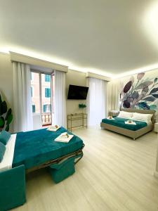 A bed or beds in a room at San Pietro Rooms 84