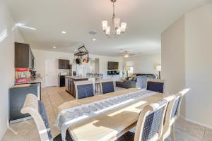 a dining room and kitchen with a table and chairs at Family-Friendly Home with Playroom in San Tan Valley in San Tan Valley