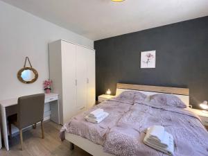 Postel nebo postele na pokoji v ubytování Apartment Butkovic