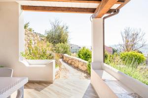 A seating area at Appartamento Turistico L'ulivo