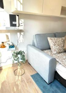 a living room with a couch and a table at Casa Sofia in Bologna