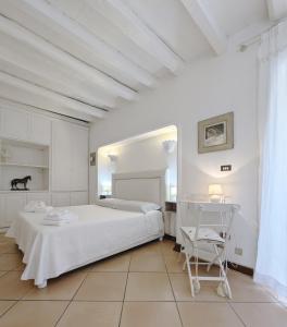 A bed or beds in a room at Setes - Appartamento in centro