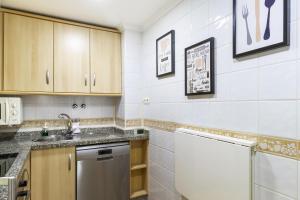 Kuchyňa alebo kuchynka v ubytovaní Apartamento Pink Medsea
