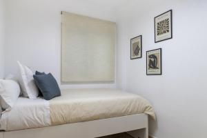 Posteľ alebo postele v izbe v ubytovaní Apartamento Pink Medsea