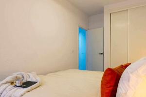 Posteľ alebo postele v izbe v ubytovaní Apartamento Pink Puerto
