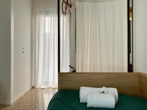 Postel nebo postele na pokoji v ubytování Buonocore Guesthouse