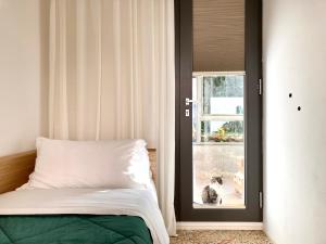 Postel nebo postele na pokoji v ubytování Buonocore Guesthouse