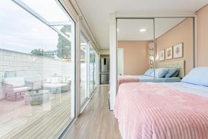 Postel nebo postele na pokoji v ubytování Loft garden com jacuzzi no Campeche