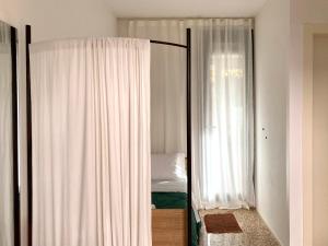 Postel nebo postele na pokoji v ubytování Buonocore Guesthouse