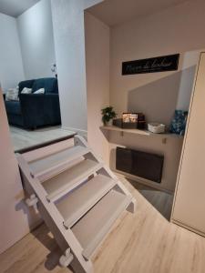 Η κουζίνα ή μικρή κουζίνα στο Appartement Au petit bonheur +9 φωτογραφίες