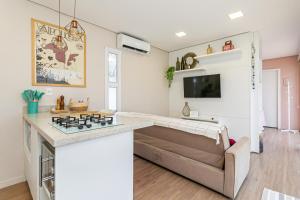 TV a/nebo společenská místnost v ubytování Loft garden com jacuzzi no Campeche