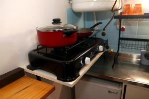 Una cocina o kitchenette en Loft Mendoza Capital Musica y Fotografia