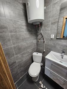 Koupelna v ubytování City apartment with moutain view - free parking + 11 fotografií