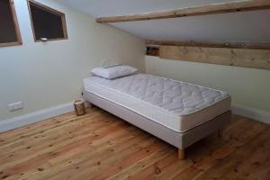 Postel nebo postele na pokoji v ubytování Maison créole Marguerite Rose