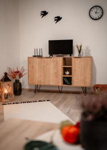 TV a/nebo společenská místnost v ubytování Pohodička pod Verpánem + 37 fotografií