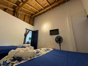 Postel nebo postele na pokoji v ubytování Finca Hotel San Cristobal Quindio