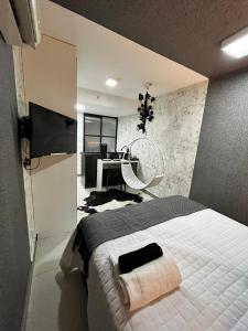 Μια τηλεόραση ή/και κέντρο ψυχαγωγίας στο STUDIOS DE LUXO Recreio RJ até 4P