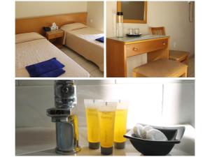 Postel nebo postele na pokoji v ubytování Denis Hotel