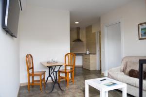 Kuchyňa alebo kuchynka v ubytovaní Apartamentos Playa De Cóbreces