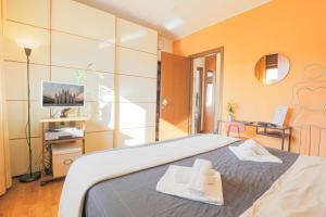 Postel nebo postele na pokoji v ubytování Camera Matrimoniale Sud Milano, Bagno Privato
