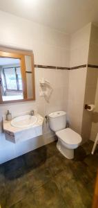 Kúpeľňa v ubytovaní Apartamentos Playa De Cóbreces