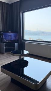 TV a/nebo společenská místnost v ubytování Bosphorus