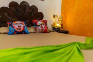 Postel nebo postele na pokoji v ubytování Hotel Posada De Roger