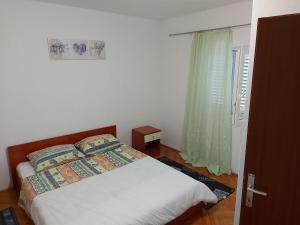 Posteľ alebo postele v izbe v ubytovaní Apartment Bila