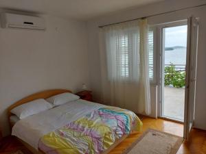 Posteľ alebo postele v izbe v ubytovaní Apartment Bila