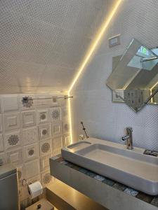Koupelna v ubytování Pousada Behling Haus + 37 fotografií