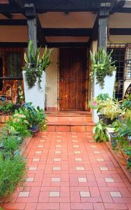 Κήπος έξω από το Habitación con baño privado en el corazón de Manga