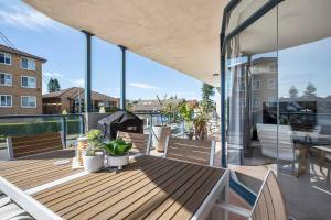 Балкон или терраса в The Wellington - A Beachside Balcony Haven