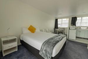 Postel nebo postele na pokoji v ubytování Marton Motel NZ