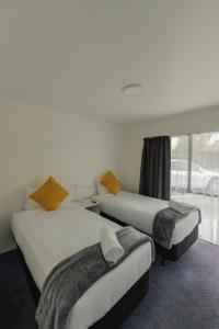 Postel nebo postele na pokoji v ubytování Marton Motel NZ