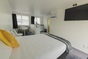 Postel nebo postele na pokoji v ubytování Marton Motel NZ