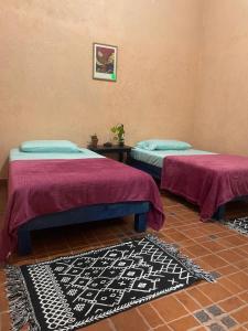 Voodi või voodid majutusasutuse Casa Mar de Marias Spa Holistico toas