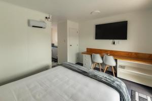 Postel nebo postele na pokoji v ubytování Marton Motel NZ