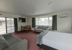 Postel nebo postele na pokoji v ubytování Marton Motel NZ