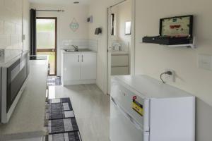 Kuchyň nebo kuchyňský kout v ubytování Marton Motel NZ